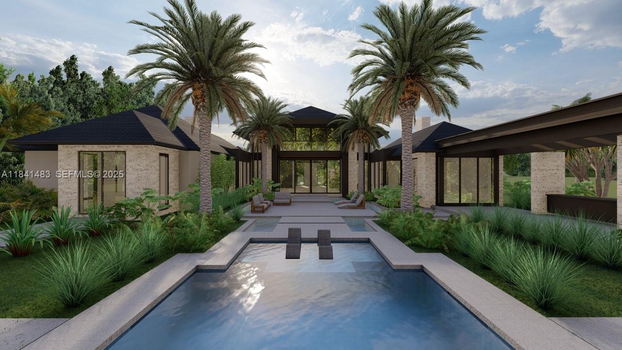 6002 Southwest 79th Court Miami, FL 33143 - Photo 7 of 47 a view of a house with a yard and potted plants