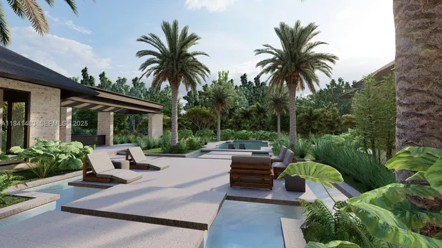 a view of a patio with couches and a fire pit