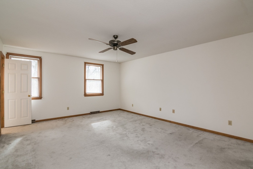 14 B Castle Hills Road, Unit 14B Agawam, MA 01001 - Photo 18 of 31 a view of an empty room with a window
