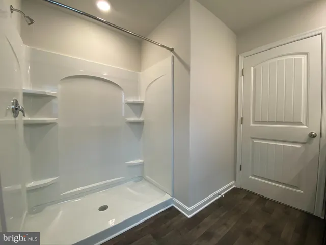 a bathroom with a bath tub