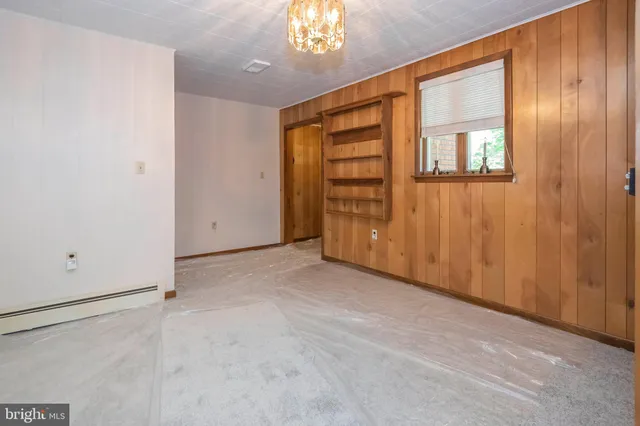 a bathroom with a bathtub and a shower curtain