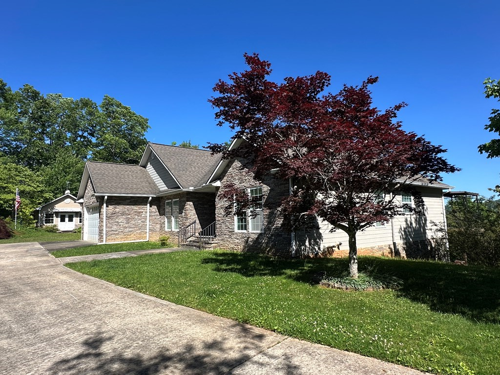 1207 Bullen Gap Road Blue Ridge, GA 30513 - Photo 19 of 37 a front view of a house with a yard