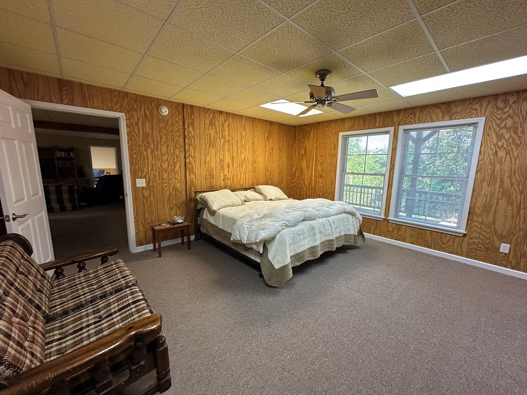1207 Bullen Gap Road Blue Ridge, GA 30513 - Photo 30 of 37 a bedroom with a bed and window