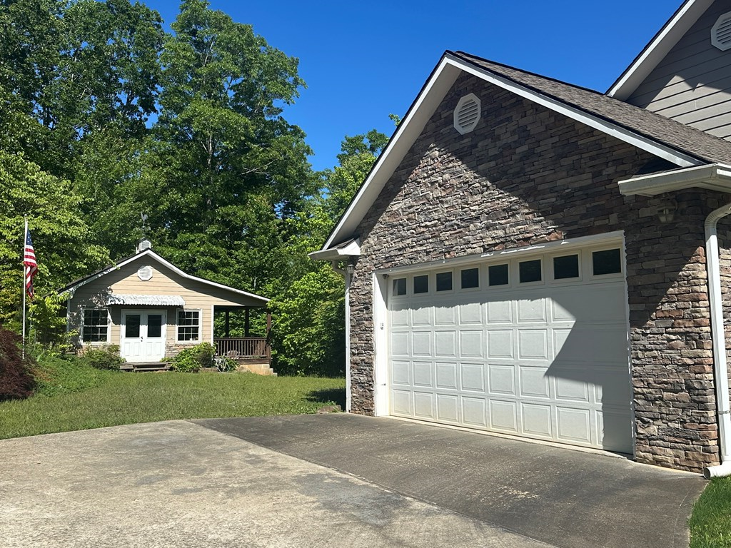 1207 Bullen Gap Road Blue Ridge, GA 30513 - Photo 3 of 37 a front view of a house with a yard