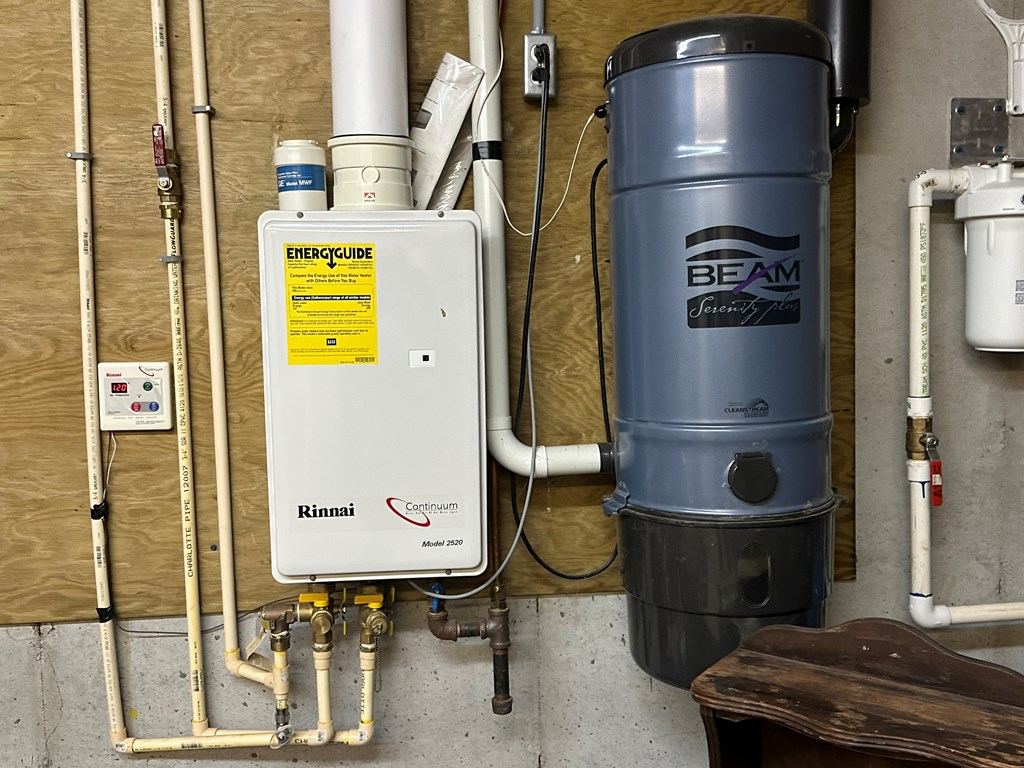 1207 Bullen Gap Road Blue Ridge, GA 30513 - Photo 33 of 37 a room with water heater and racks