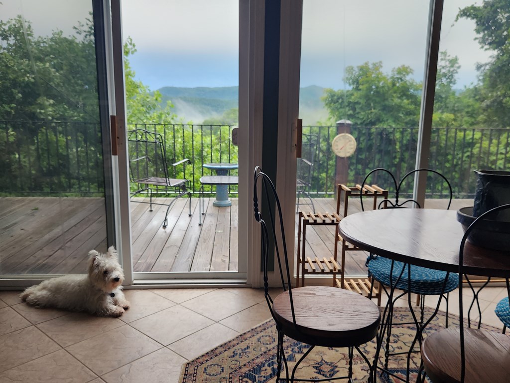 1207 Bullen Gap Road Blue Ridge, GA 30513 - Photo 35 of 37 a outdoor dining space with furniture and garden