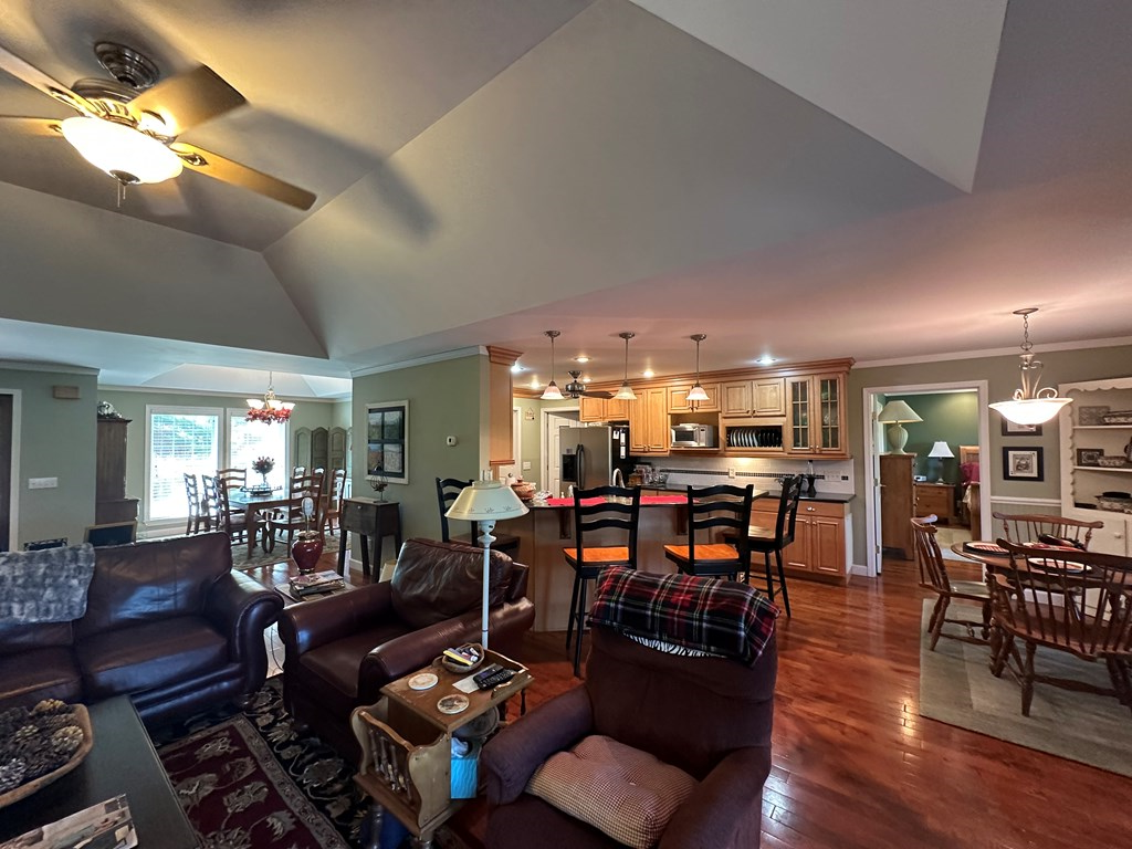 1207 Bullen Gap Road Blue Ridge, GA 30513 - Photo 4 of 37 a living room with lots of furniture and kitchen view