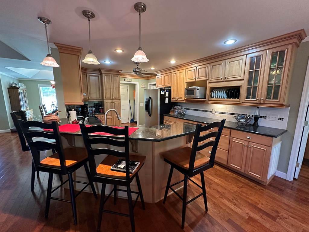 1207 Bullen Gap Road Blue Ridge, GA 30513 - Photo 5 of 37 a view of a dining room with furniture window and wooden floor
