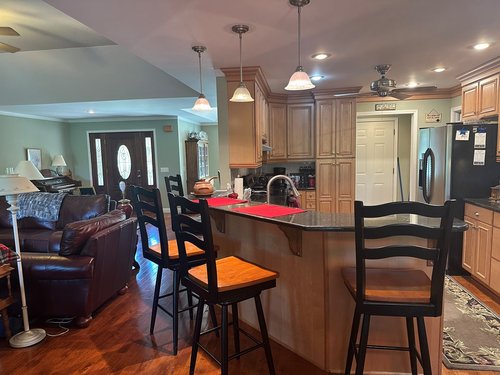1207 Bullen Gap Road Blue Ridge, GA 30513 - Photo 7 of 37 a view of a a dining room with furniture window and wooden floor