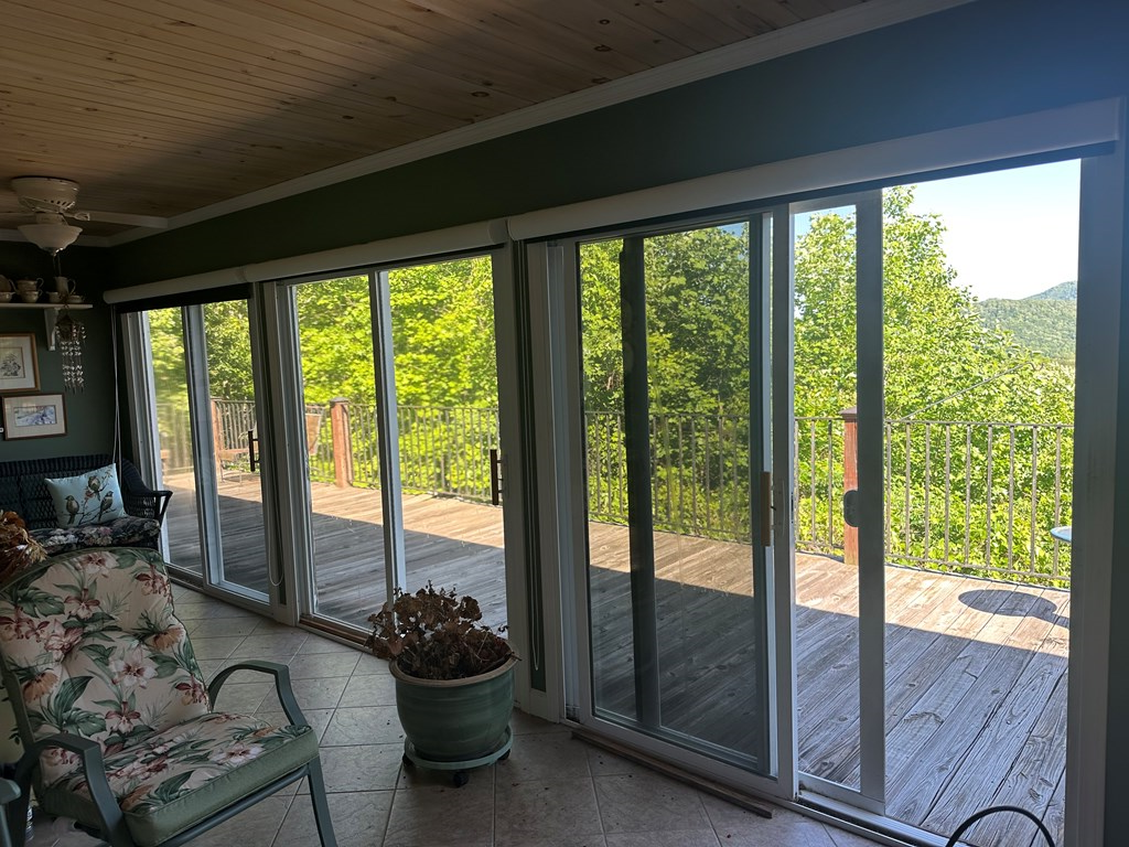 1207 Bullen Gap Road Blue Ridge, GA 30513 - Photo 10 of 37 a livingroom with furniture and floor to ceiling window