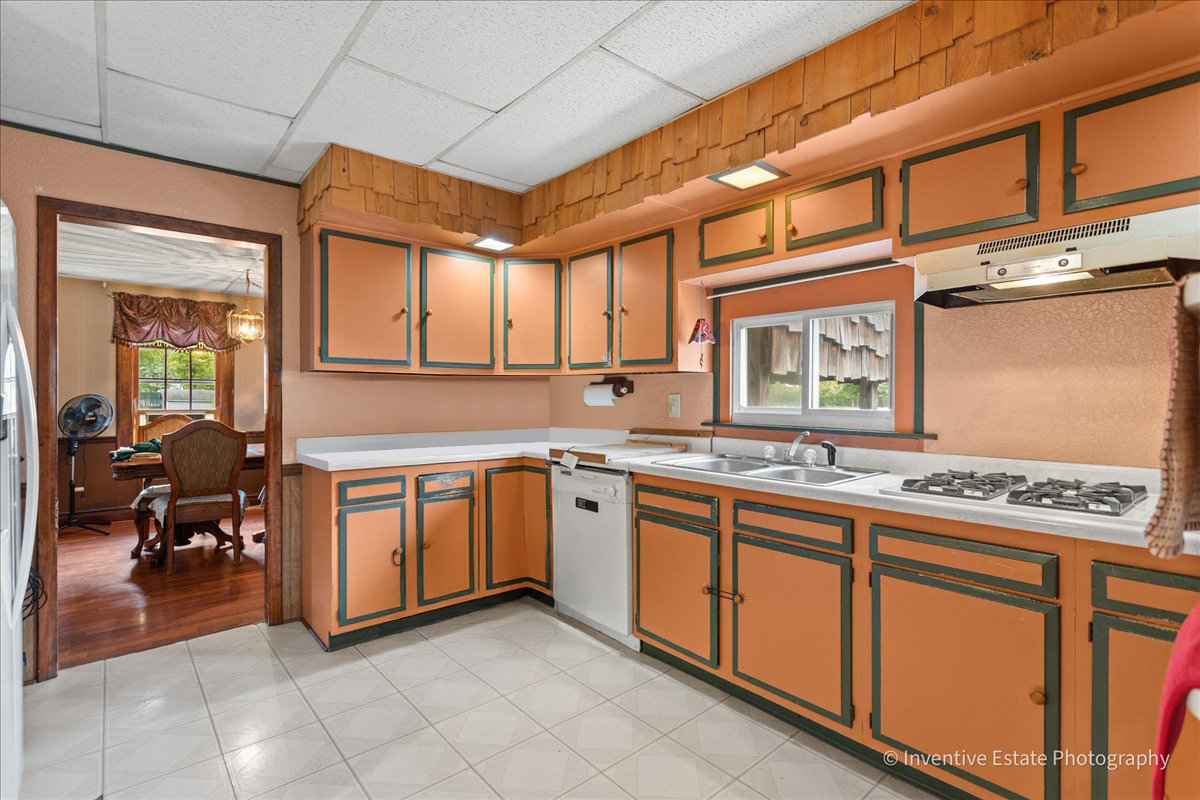 30736 South Symerton Road Wilmington, IL 60481 - Photo 8 of 25 a kitchen with cabinets a sink and appliances