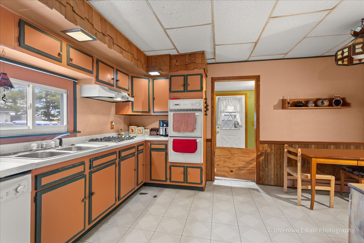 30736 South Symerton Road Wilmington, IL 60481 - Photo 9 of 25 a kitchen with stainless steel appliances granite countertop a sink and cabinets