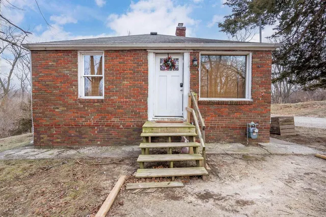 a front view of a house with a window