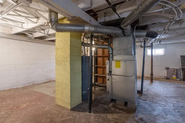 a view of a room with wooden walls