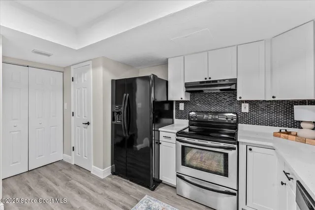 a kitchen with a sink and a cabinets
