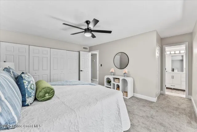a kitchen with a sink and a mirror
