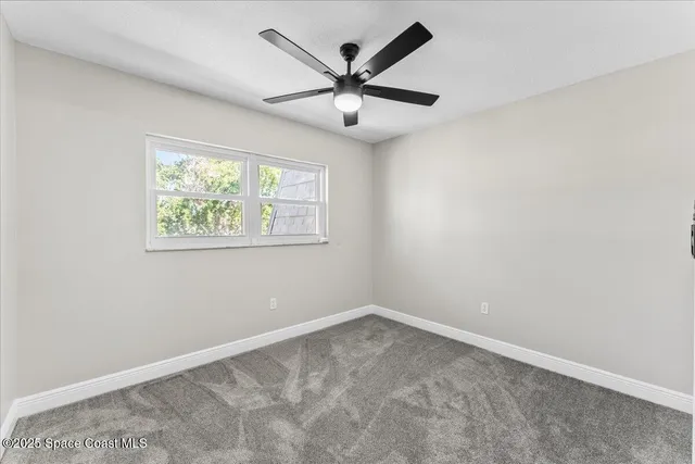 a view of entryway with bathroom