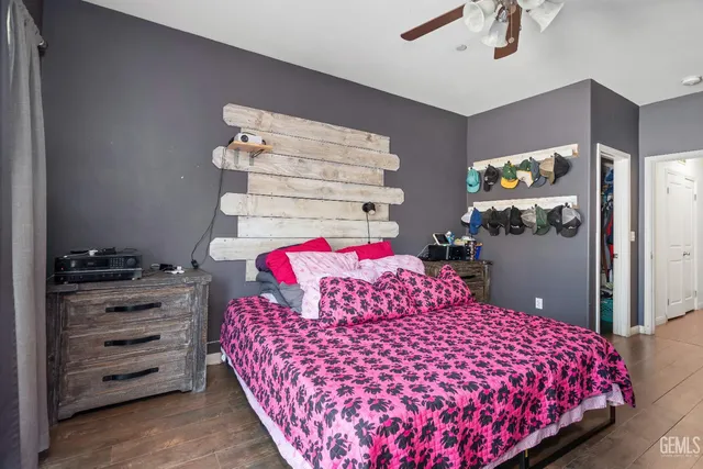 a bedroom with a bed and a closet