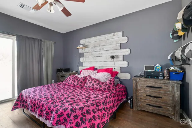 a bedroom with a bed and a closet