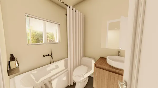 a spacious bedroom with a bed and a window