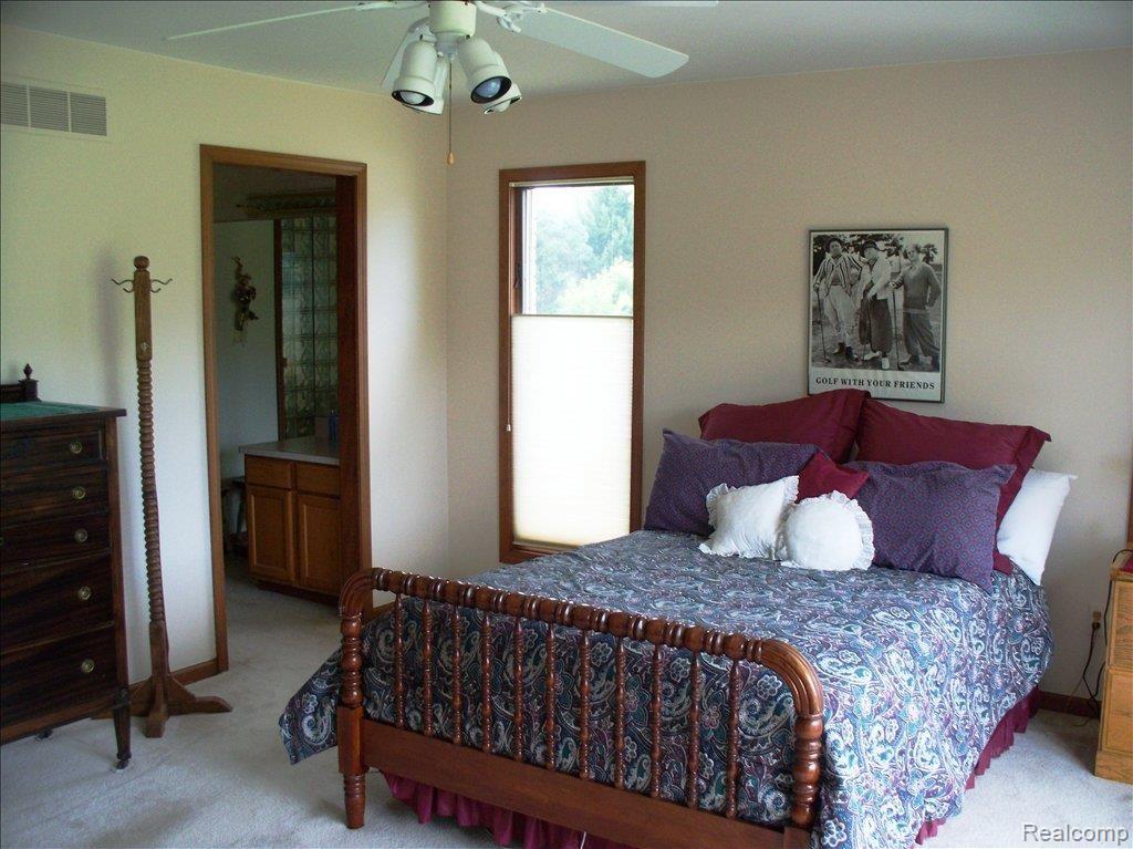 9159 Parshallville Road Fenton, MI 48430 - Photo 16 of 25 Master bedroom