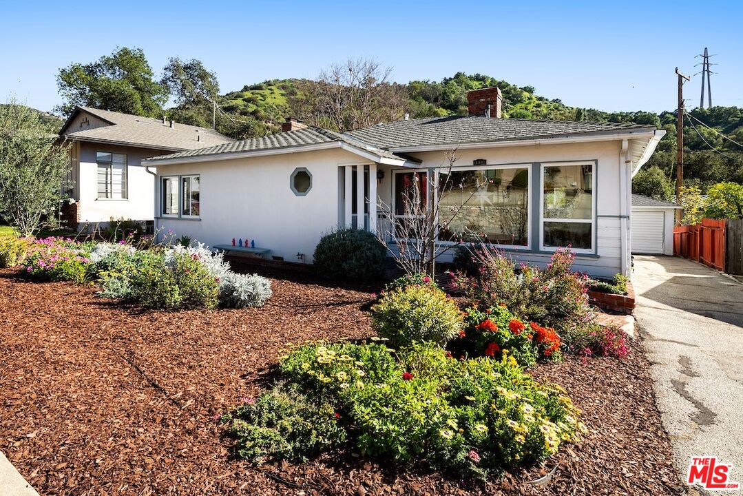 1856 Alpha Road Glendale, CA 91208 - Photo 1 of 32 front view of a house with a yard
