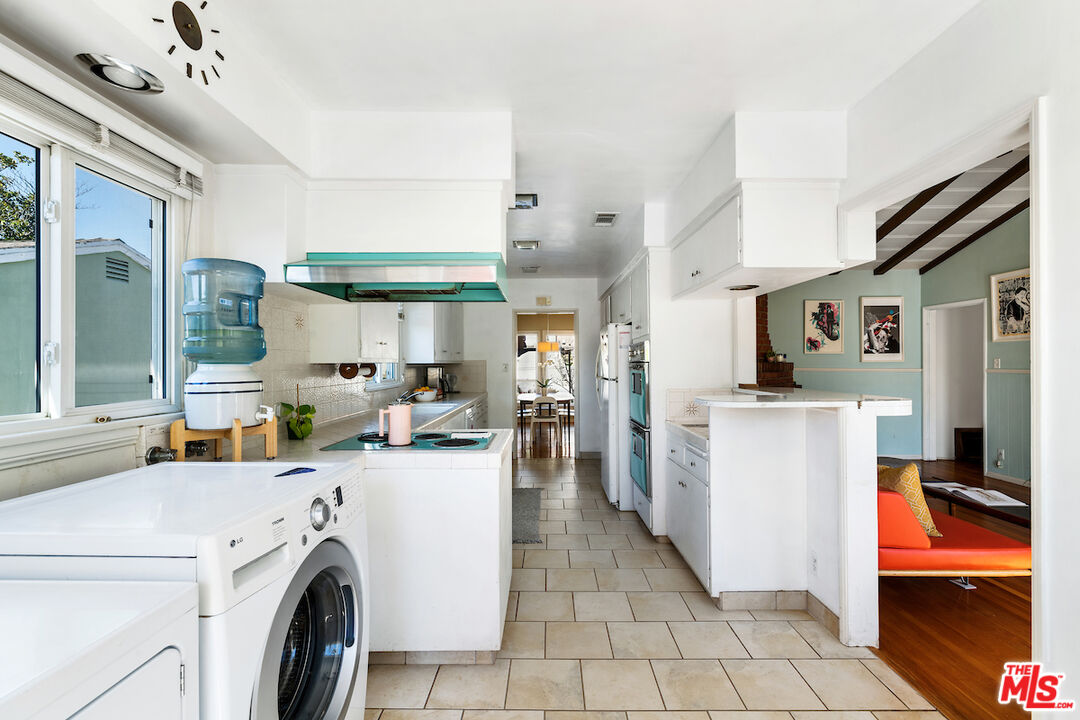 1856 Alpha Road Glendale, CA 91208 - Photo 14 of 32 a view of kitchen and washer and dryer