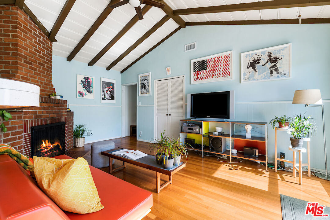 1856 Alpha Road Glendale, CA 91208 - Photo 19 of 32 a living room with furniture and a fireplace