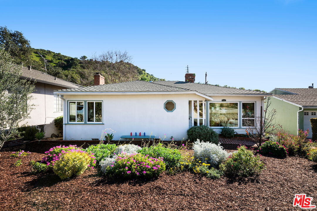 1856 Alpha Road Glendale, CA 91208 - Photo 2 of 32 a front view of a house with a yard