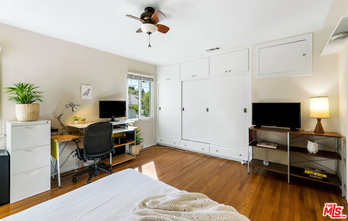 1856 Alpha Road Glendale, CA 91208 - Photo 23 of 32 a view of a livingroom with workspace and a couch