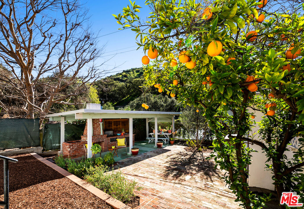 1856 Alpha Road Glendale, CA 91208 - Photo 28 of 32 a front view of a house with garden