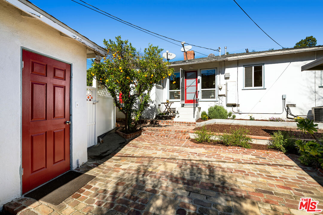1856 Alpha Road Glendale, CA 91208 - Photo 30 of 32 a front view of a house with garden