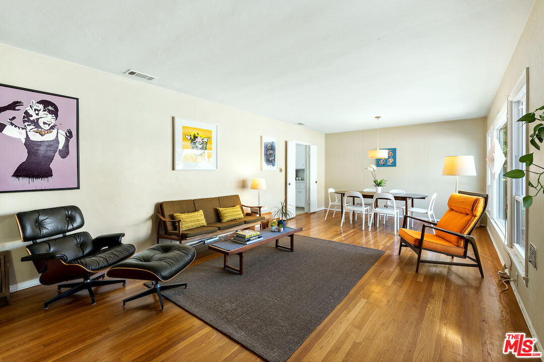 1856 Alpha Road Glendale, CA 91208 - Photo 6 of 32 a living room with furniture and a wooden floor
