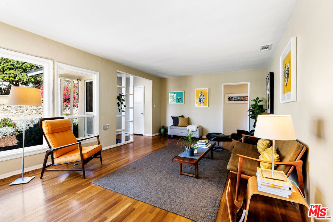 1856 Alpha Road Glendale, CA 91208 - Photo 7 of 32 a living room with furniture and wooden floor