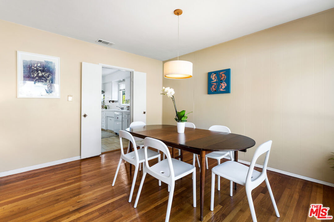 1856 Alpha Road Glendale, CA 91208 - Photo 9 of 32 a view of a dining room with furniture and wooden floor