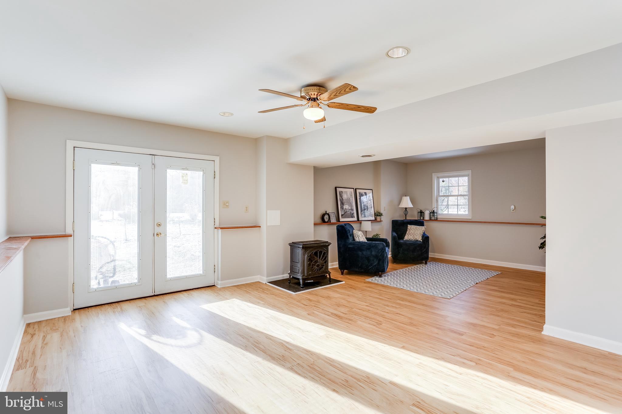 4939 A Elmer Derr Road Frederick, MD 21703 - Photo 18 of 29 a view of a livingroom with a workspace