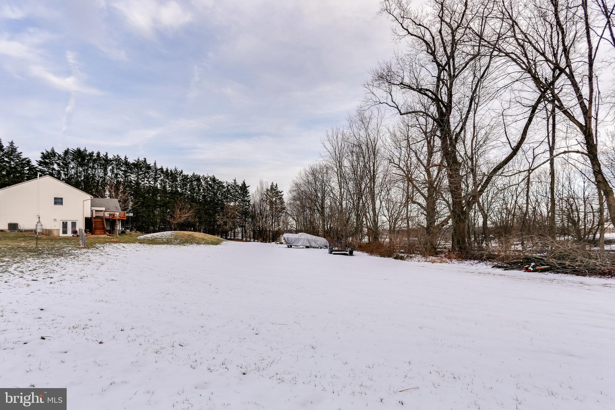 4939 A Elmer Derr Road Frederick, MD 21703 - Photo 29 of 29 a view of large space with a house in the background