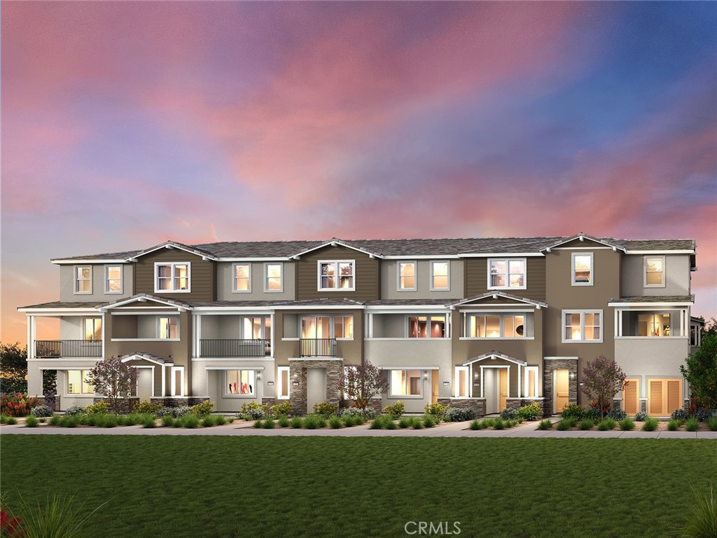 202 Palm Road San Marcos, CA 92069 - Photo 1 of 12 a front view of a residential apartment building with a yard