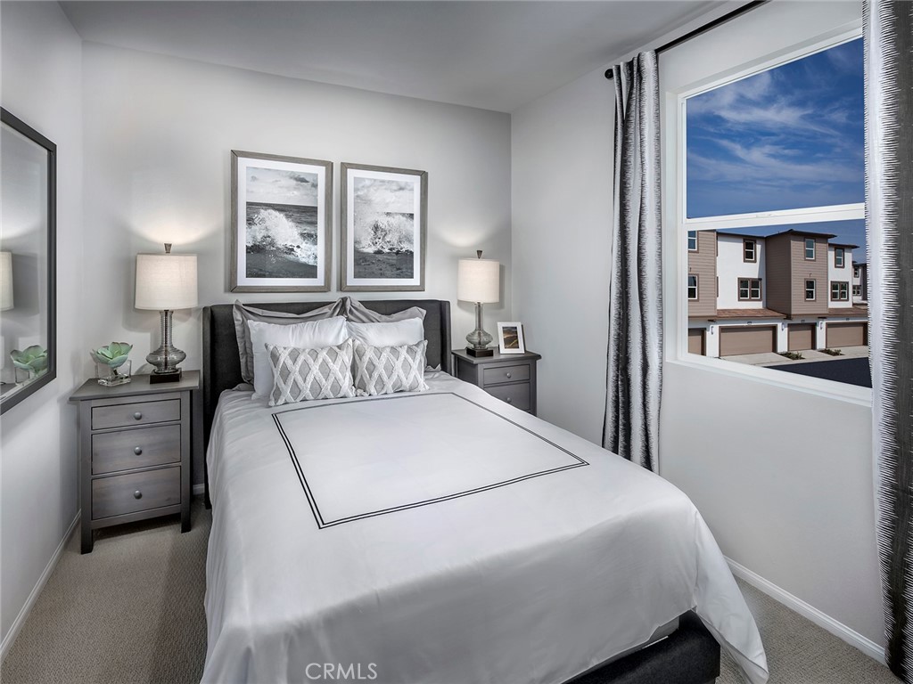 202 Palm Road San Marcos, CA 92069 - Photo 9 of 12 a bedroom with a bed and a window