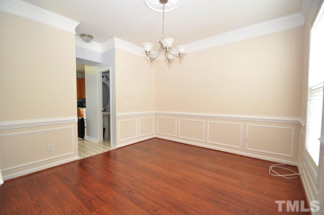 2529 Dality Drive Raleigh, NC 27604 - Photo 3 of 20 wooden floor in an empty room with a window