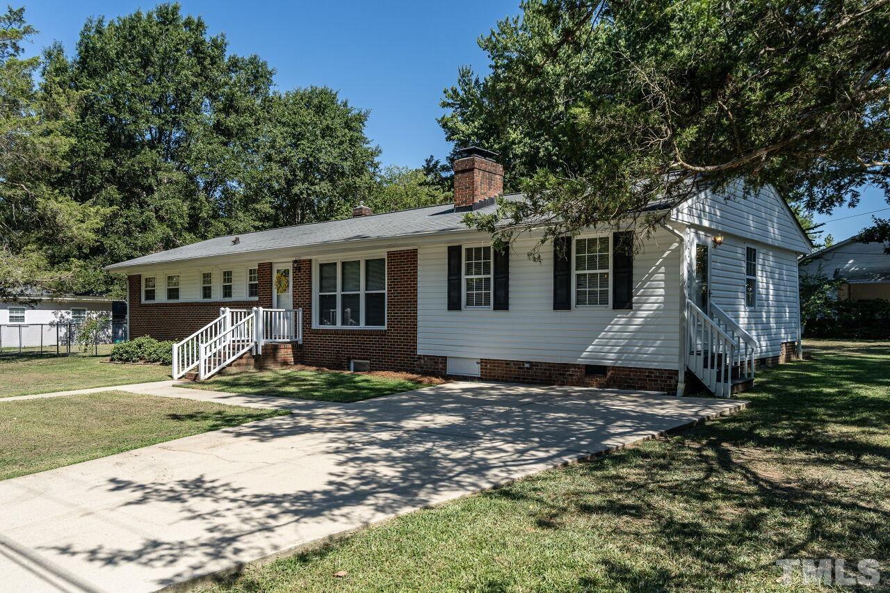 202 Purvis Street Garner, NC 27529 - Photo 2 of 29 a view of a house with backyard