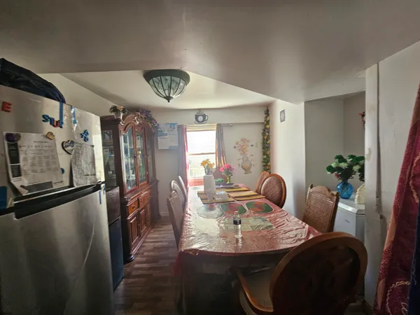 a view of a dining room with furniture