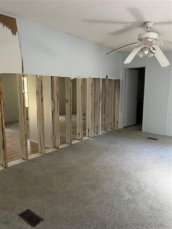 1130 Southwest 133rd Ave Road Ocala, FL 34481 - Photo 8 of 24 a view of a livingroom with a staircase