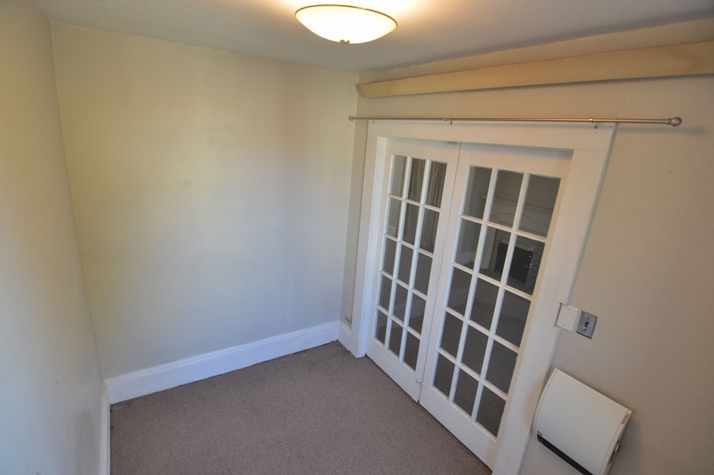 11 Savin Hill Avenue Boston, MA 02125 - Photo 18 of 40 a view of an empty room