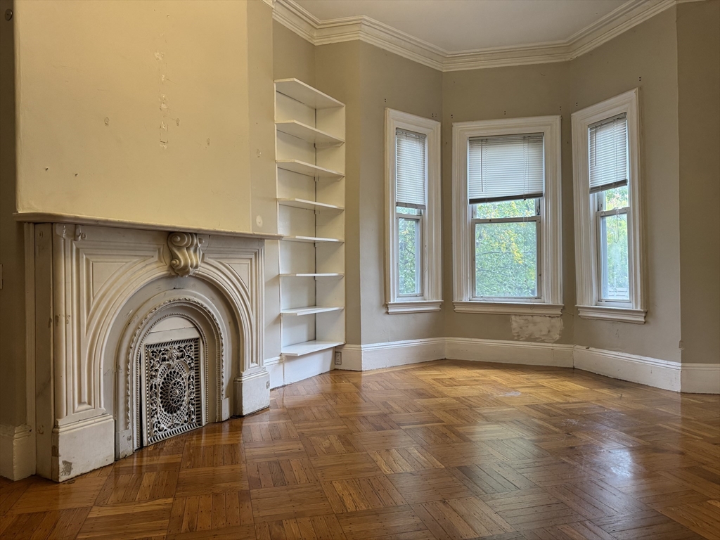 11 Savin Hill Avenue Boston, MA 02125 - Photo 25 of 40 a view of a livingroom with a large window