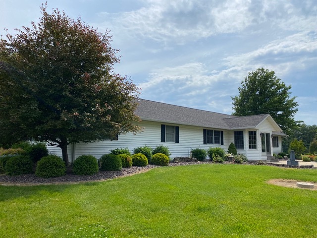11426 East Radisson Road Mount Vernon, IL 62864 - Photo 34 of 56 a view of a house with a yard and potted plants