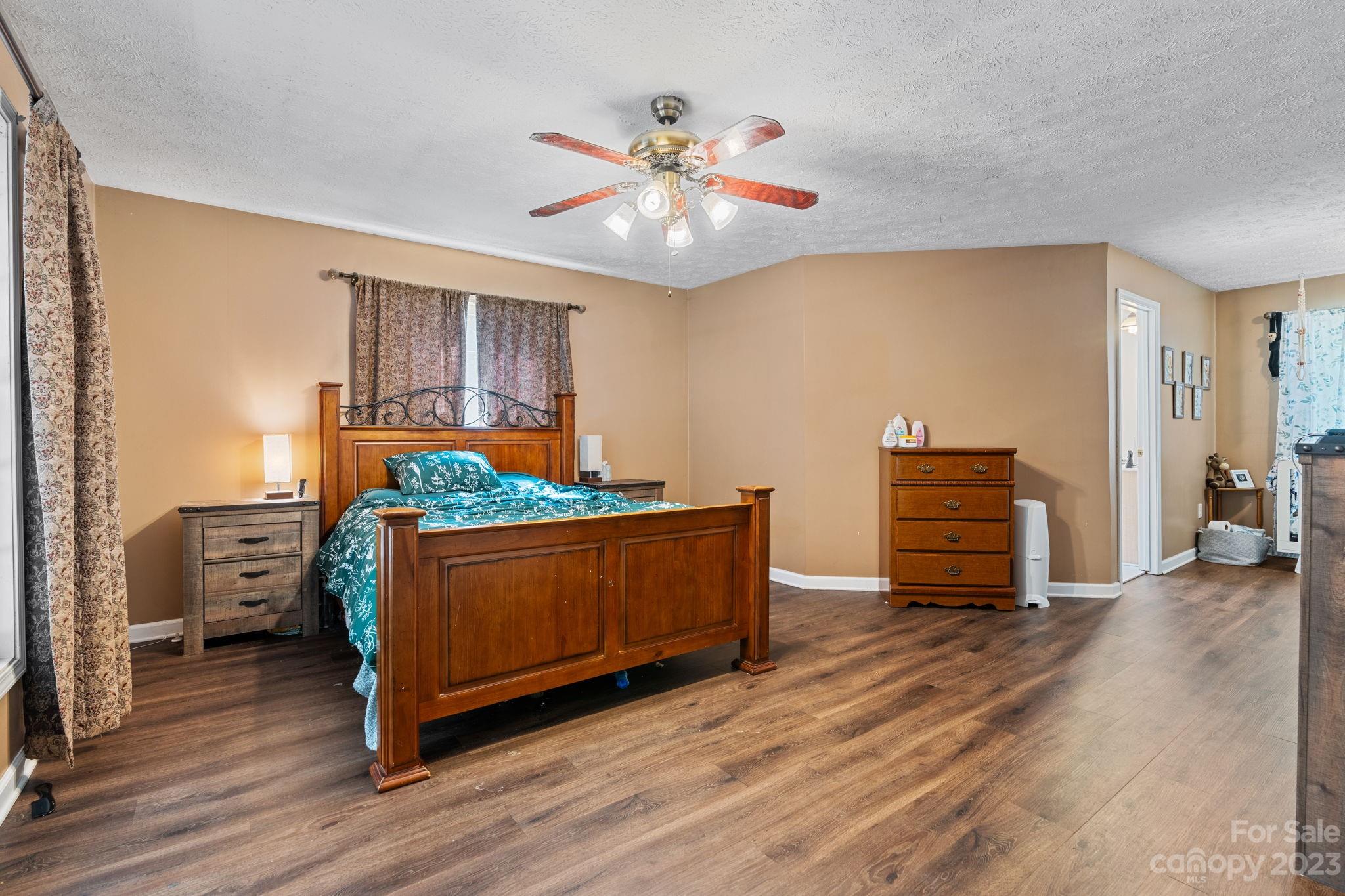 42 Bear Trail Fairview, NC 28730 - Photo 14 of 37 a living room with furniture and wooden floor