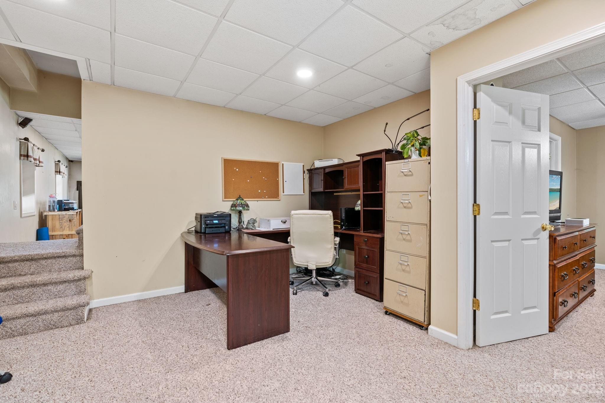 42 Bear Trail Fairview, NC 28730 - Photo 29 of 37 a view of a kitchen with refrigerator and workspace