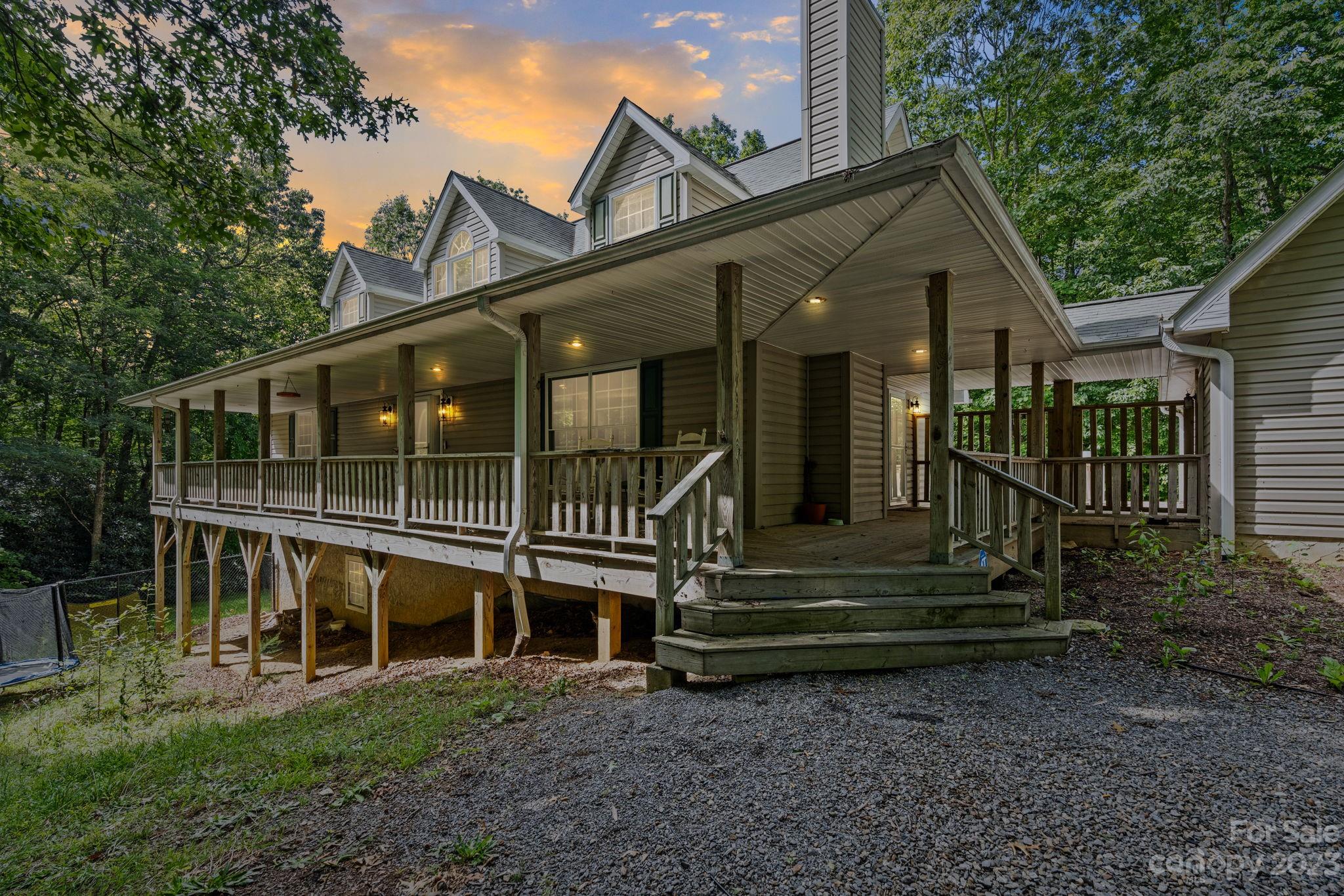 42 Bear Trail Fairview, NC 28730 - Photo 3 of 37 a view of a house with a yard and sitting area