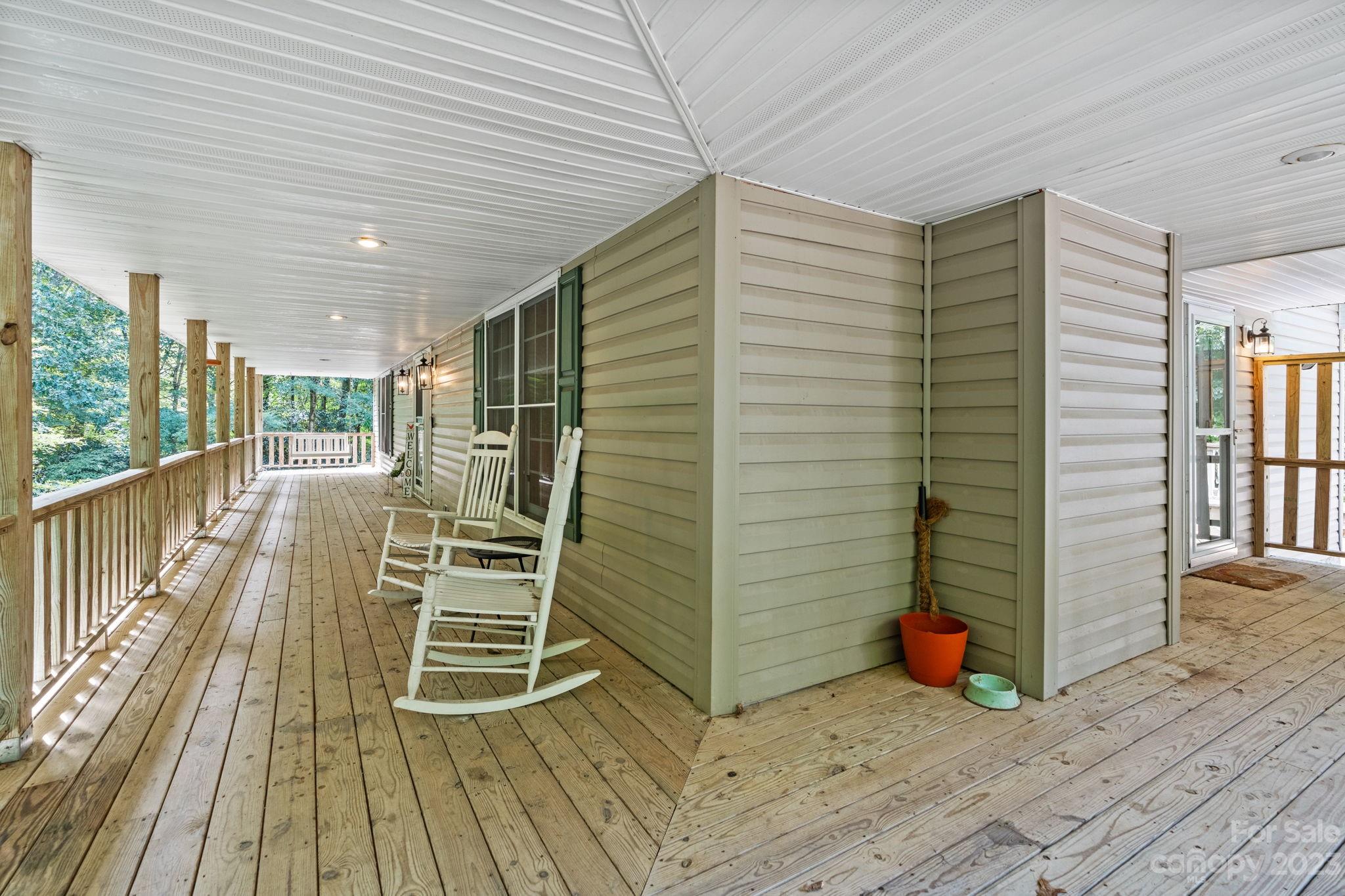 42 Bear Trail Fairview, NC 28730 - Photo 35 of 37 a view of outdoor space with wooden floor and seating